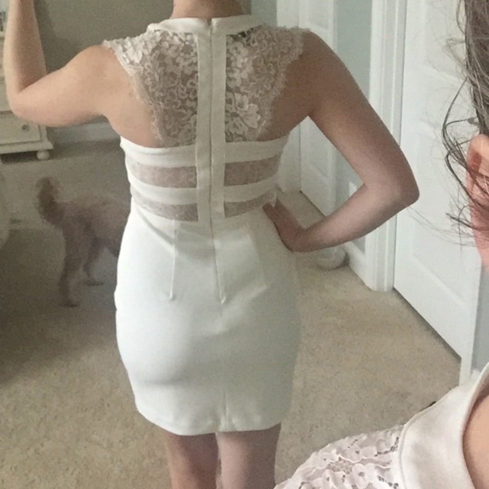 White fitted dress with lace detail